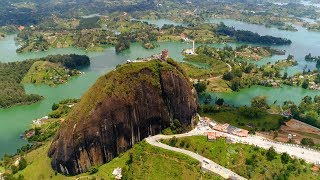 CLIMBING A GIANT ROCK IN GUATAPÉ COLOMBIA EL PEÑOL TRAVEL VLOG  Eileen Aldis [upl. by Sissie792]