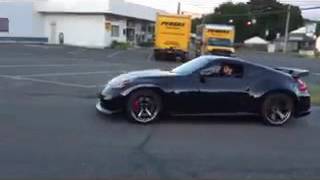 370z Nismo Tomei exhaust Motordyne ART pipes drive by [upl. by Nylicaj]