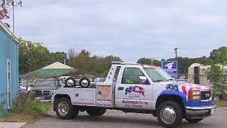 Drivers file lawsuit against towing company [upl. by Richarda104]