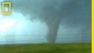 Tornadoes Lightning in Rare Video  National Geographic [upl. by Hawger]