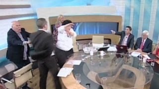 Greek politician throws water smacks female opponent [upl. by Kilan733]